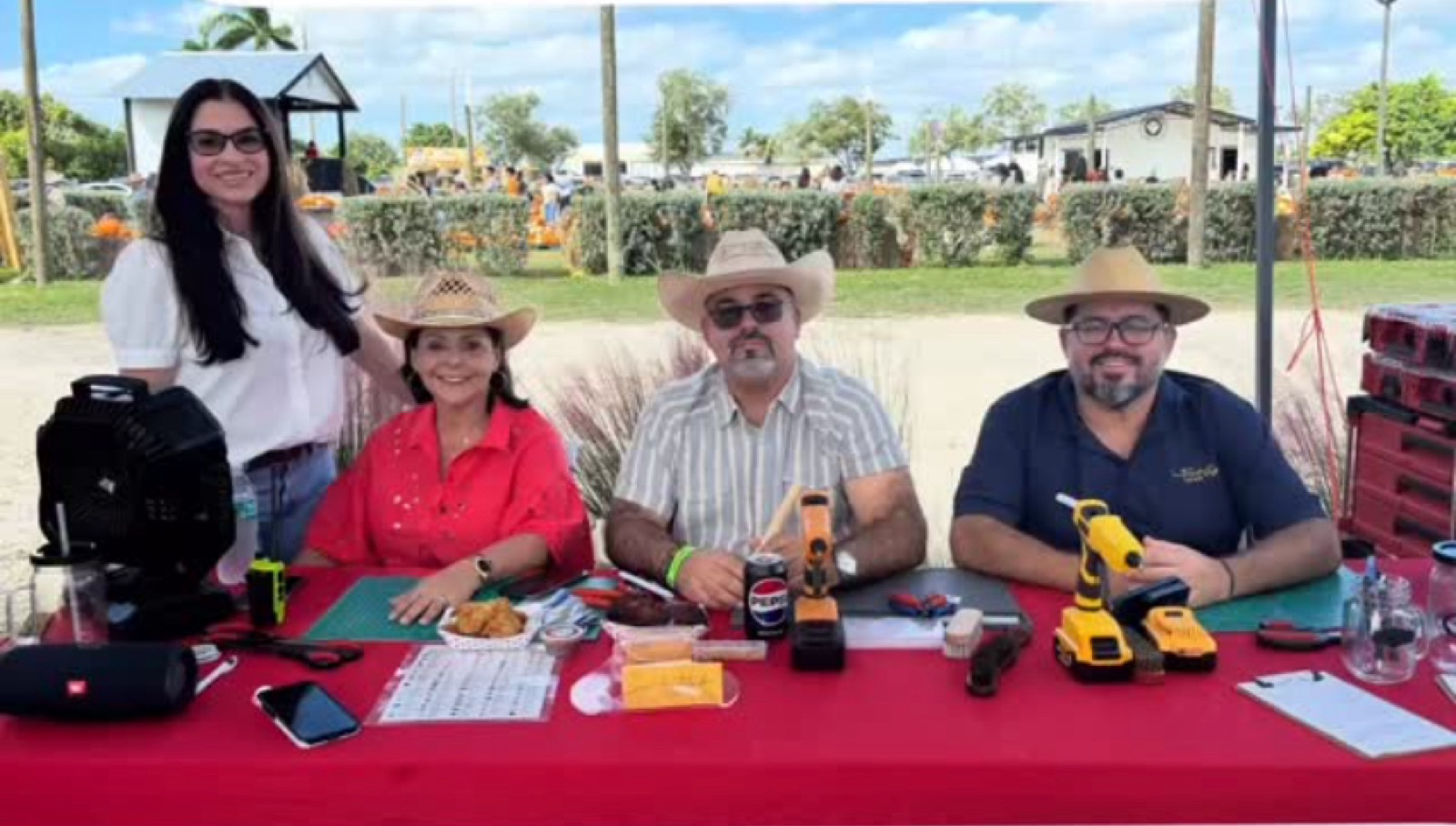 The Hattitude Hat Bar team at a Miami vendor booth